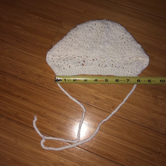 Hand knit baby bonnet in a creamy white color - Picture 7 of 8